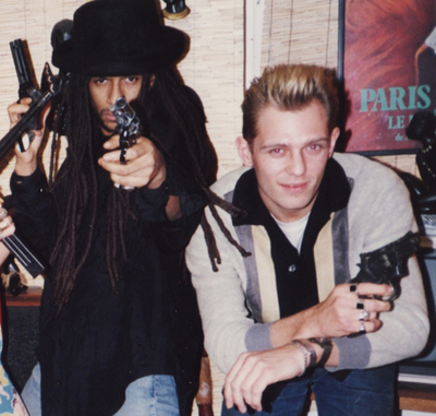 Don Letts and Clash bassist Paul Simonon brandish the Guns of Brixton